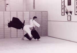 Parker Sensei doing an advanced technique on her student and fellow instructor.