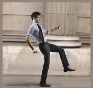 A man appear unable to make himself take a step forward